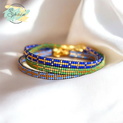 پابند میوکی شاین گالری با طرح صلیب طلایی، تولید شده با منجوقهای باکیفیت ژاپنی و مناسب هدیهای خاص و ماندگار.