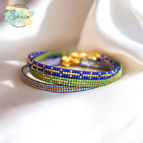 پابند میوکی شاین گالری با طرح صلیب طلایی، تولید شده با منجوقهای باکیفیت ژاپنی و مناسب هدیهای خاص و ماندگار.