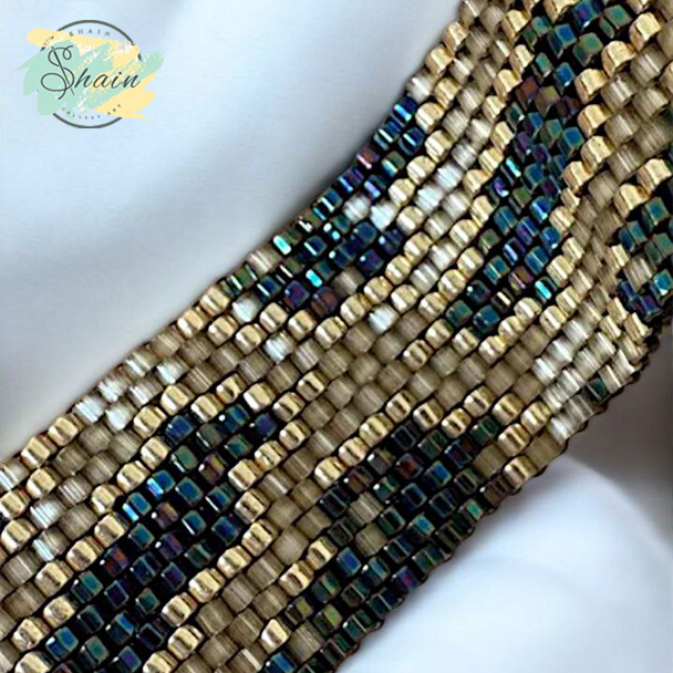 دستبند فانتزی و خاص شاین گالری با منجقهای میوکی و استیل ضد حساسیت طرح پوست مار