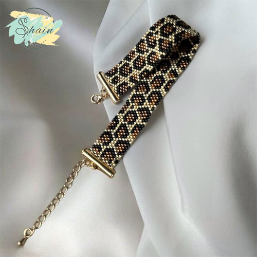 دستبند دستساز میوکی طرح پلنگی با منجوقهای ژاپنی اصل و بند باکیفیت، مناسب استایل روزمره و مجلسی از برند شاین گالری.