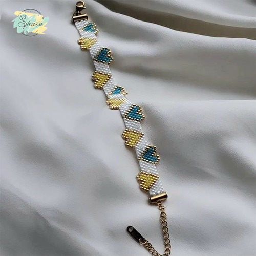 دستبند میوکی طرح قلب برجسته با منجوقهای ژاپنی اصل، مناسب استایل روزمره و هدیه دادن، طراحی خاص و ساخت دست هنرمندان شاین گالری