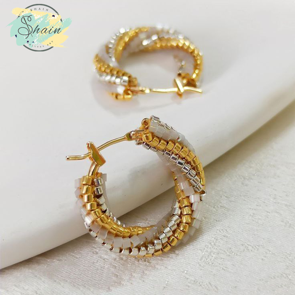 گوشواره اریسا کد 3126 ساخته شده با منجوق میوکی ژاپنی، طراحی دستساز شاین گالری مناسب استایل روزمره و مهمانیهای خاص.