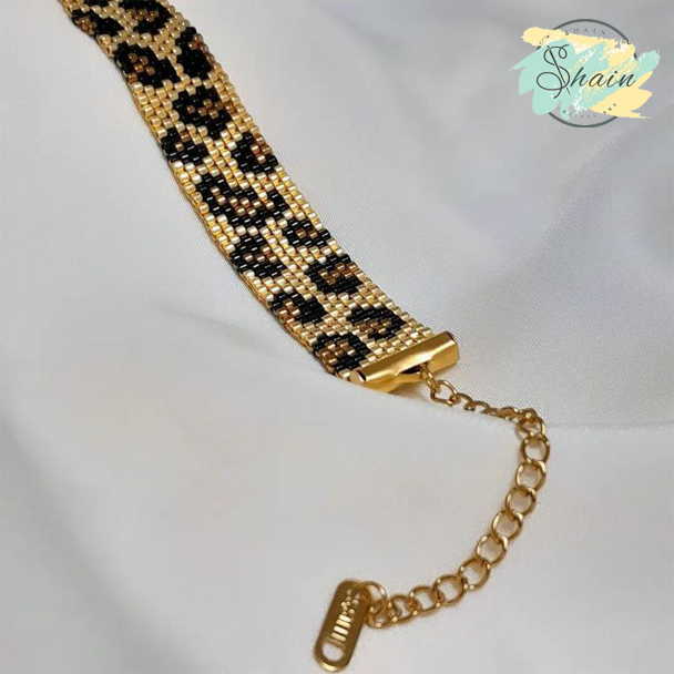 دستبند فانتزی زنانه میوکی با طرح پلنگی طلایی، سبک، راحت و مناسب انواع استایل رسمی و اسپرت